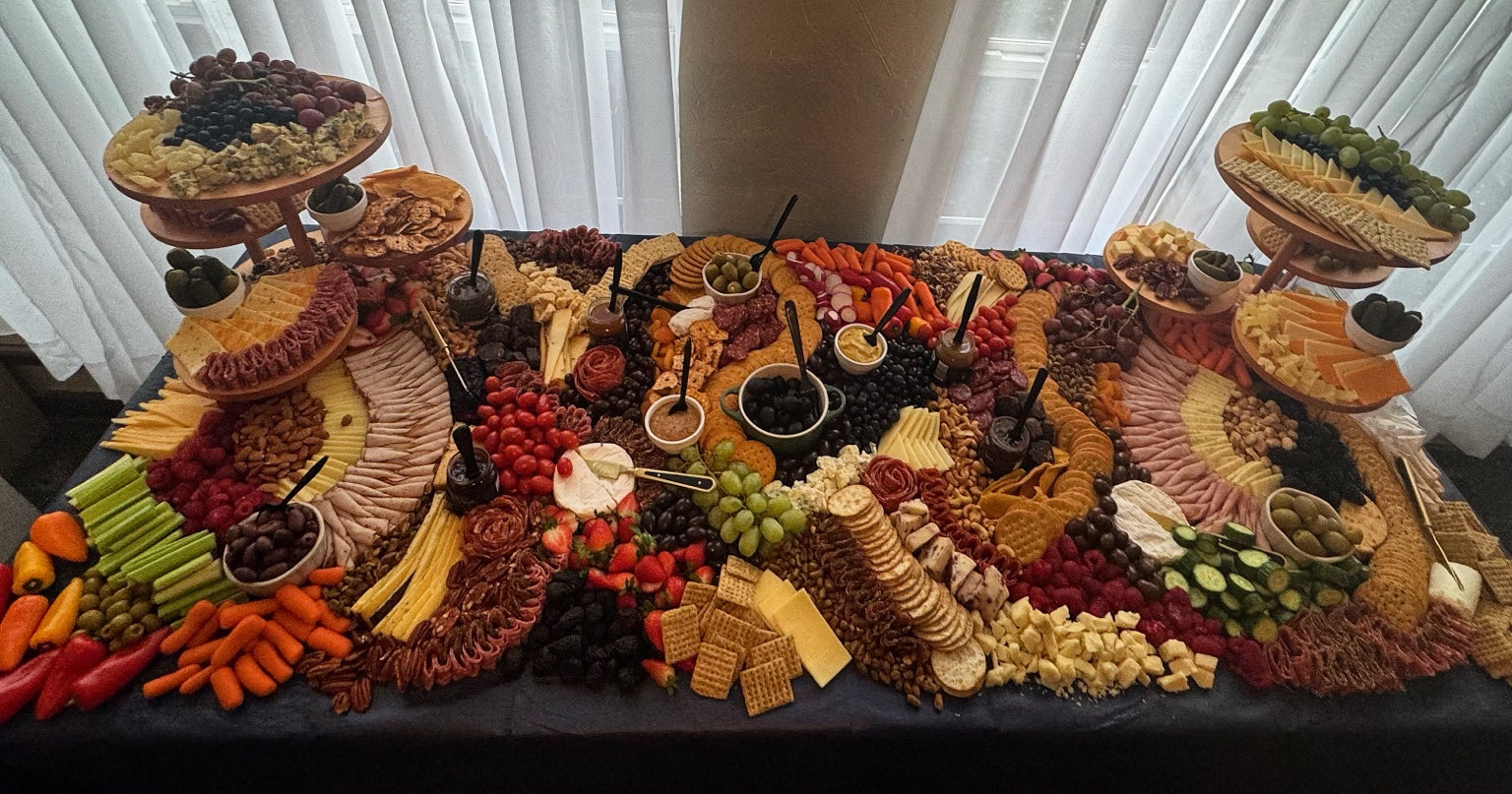 An abundant grazing table styled by The Gathered Board